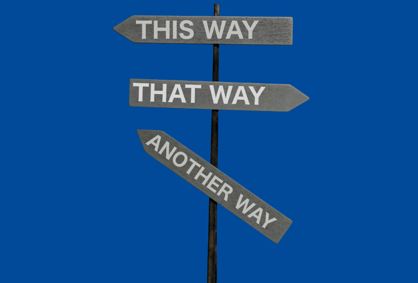 A graphic of a signpost on a blue background with signs saying That Way and Another Way pointing in different directions.