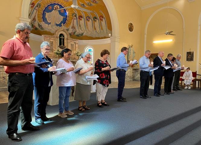 Members in church praying