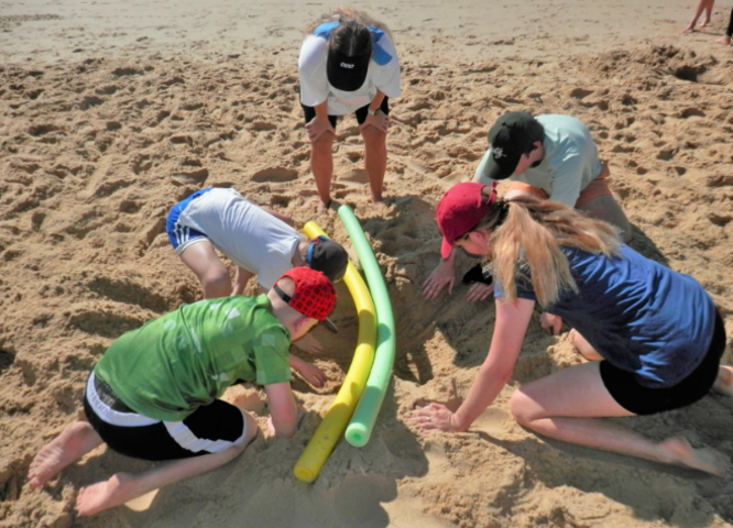 Youth participating in Vinnies Youth activities on beach