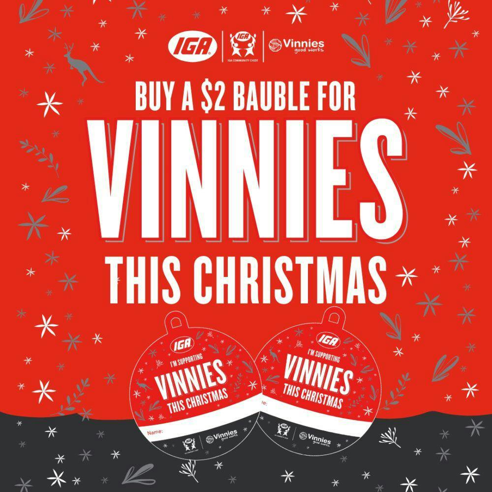 An image with a red background with Christmas symbols. At the centre is the text "Buy a $2 bauble for Vinnies this Christmas".