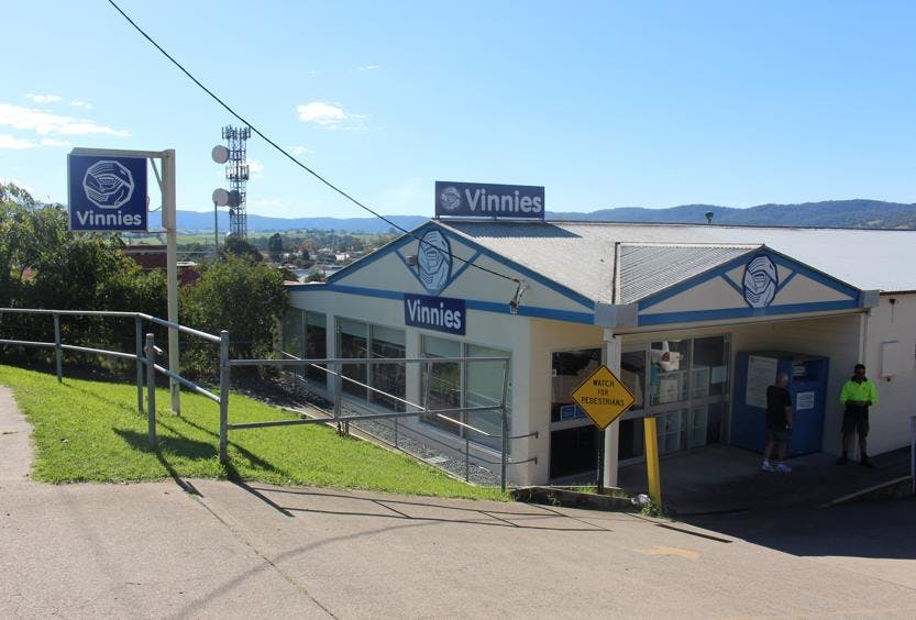 A look outside Vinnies Bega with mountainous views behind.