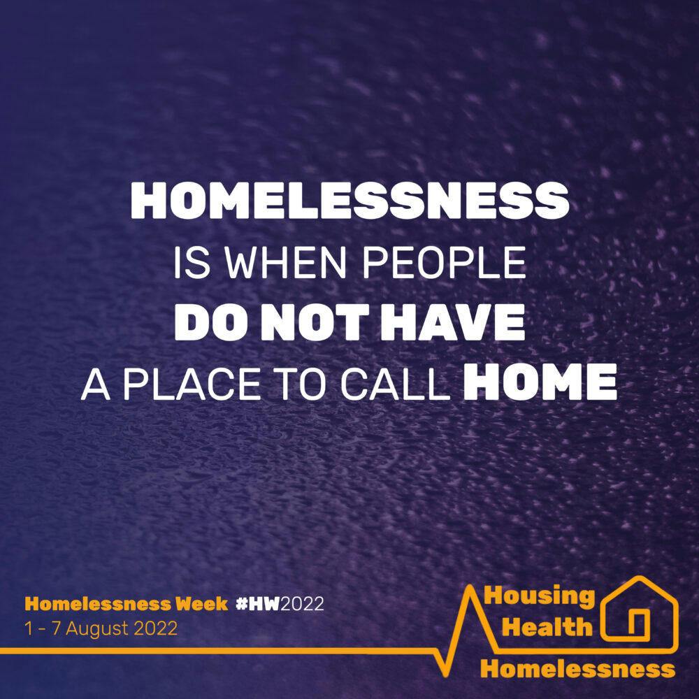 A poster with a dark purple background with a white text saying "Homelessness is when people do not have a place to call home".
